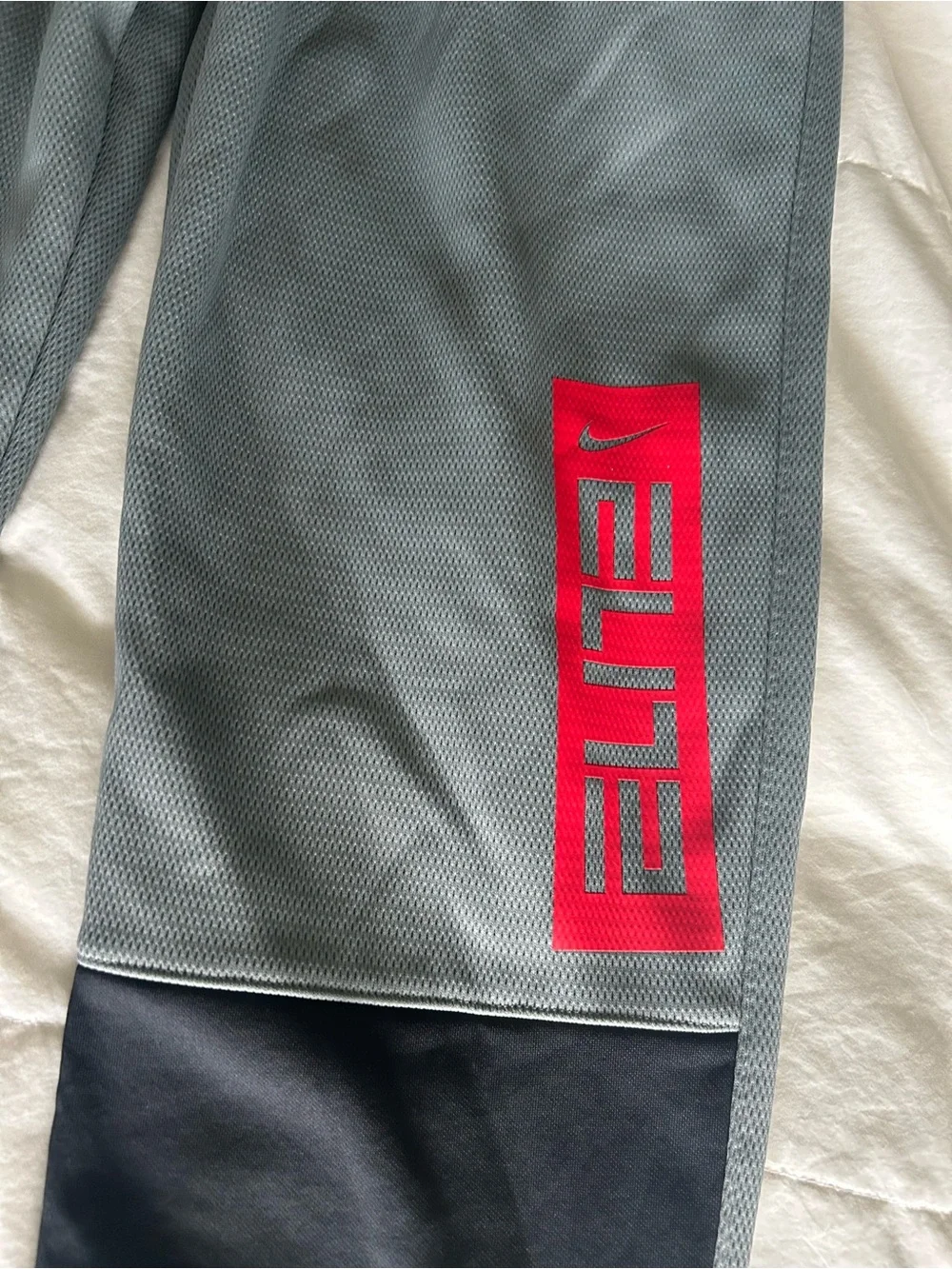 Nike Dri fit Grey and Black Joggers with Red Accent. New w/o tags. Youth XL.